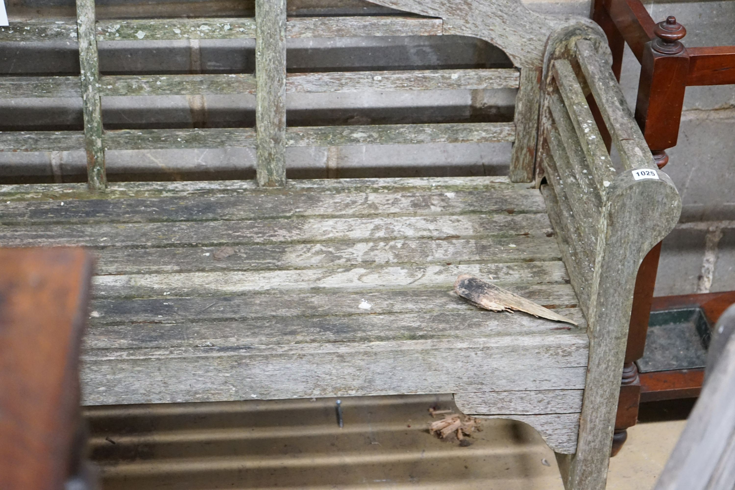A Lutyens style teak garden bench, length 158cm, depth 51cm, height 98cm